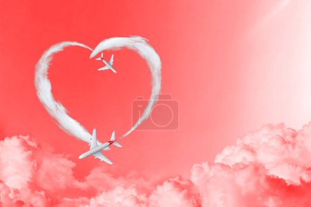 Téléchargez les photos : Valentines week special illustration idea. Airplanes make heart shape of smoke clouds on sky. - en image libre de droit
