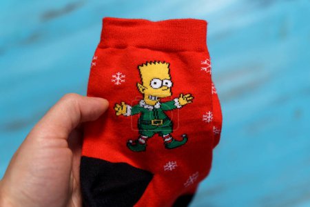 Photo for Tyumen, Russia-January 23, 2023: Socks with the image of Bart Simpson. The Simpsons is an American adult animated sitcom created by Matt Groening - Royalty Free Image