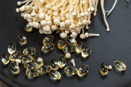 Photo for Mushroom or enoki close up, useful and medicinal properties of Asian mushrooms. - Royalty Free Image