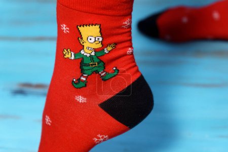 Photo for Tyumen, Russia-January 23, 2023: Socks with the image of Bart Simpson. The Simpsons is an American adult animated sitcom created by Matt Groening - Royalty Free Image