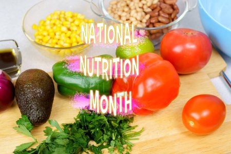 Photo for Celebrating National Nutrition Month Amidst Fresh Vegetables and Culinary Preparations - Royalty Free Image