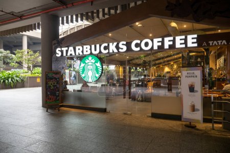 Photo for MUMBAI - SEPT 20: Exterior of Starbucks Coffee with logotype over entrance and visitors in Mumbai on September 20. 2022 in India - Royalty Free Image
