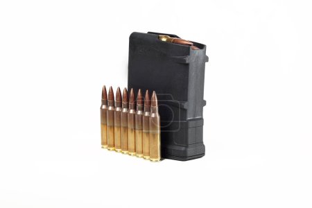 Photo for Mag with bullets for the AR 15 rifle. 223 rem - Royalty Free Image