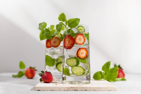Photo for Summer detox drink. Strawberry, mint and cucumber refreshing water.Infused detox water with berry, vegetable and herb. Ice cold summer lemonade. - Royalty Free Image