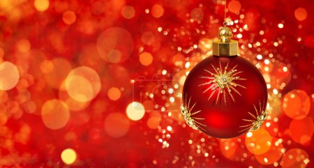 Photo for Christmas red ball with gold stars on festive background. Christmas ornaments and New Year decor. - Royalty Free Image