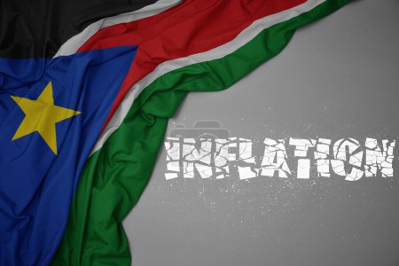 Photo for Waving colorful national flag of south sudan on a gray background with broken text inflation. concept. 3d illustration - Royalty Free Image