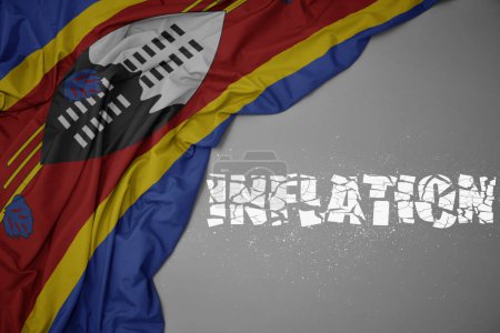 Photo for Waving colorful national flag of eswatini on a gray background with broken text inflation. concept. 3d illustration - Royalty Free Image