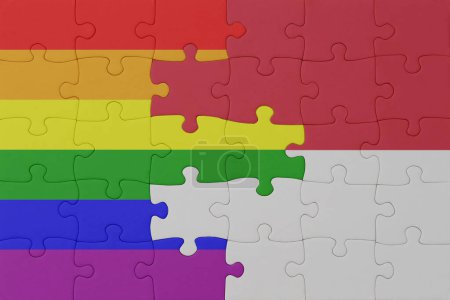 Foto de Rompecabezas con la bandera del arco iris orgullo gay y la indonesia. macro.concept. ilustración 3d - Imagen libre de derechos