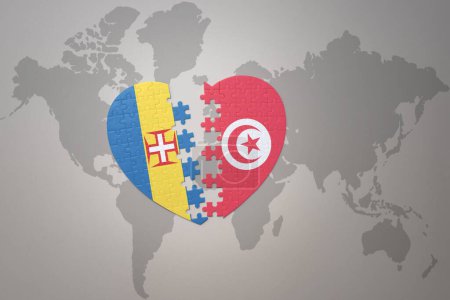 Téléchargez les photos : Coeur de puzzle avec le drapeau national de la Tunisie et de madère sur un fond de carte du monde. Concept. Illustration 3D - en image libre de droit