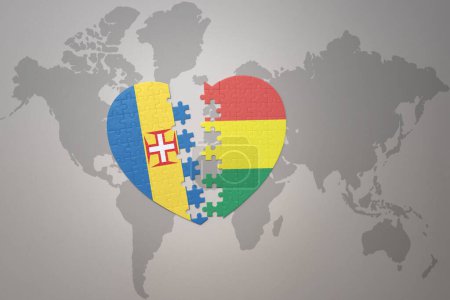 Téléchargez les photos : Coeur de puzzle avec le drapeau national de la Bolivie et de madère sur un fond de carte du monde. Concept. Illustration 3D - en image libre de droit