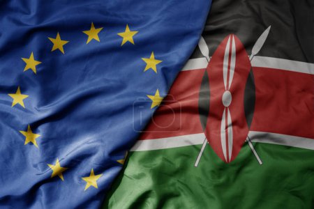 Foto de Gran ondeando bandera colorida nacional realista de la unión europea y bandera nacional de kenya. macro - Imagen libre de derechos