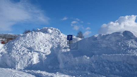 Photo for Snowdrift in a parking lot, northern Norway - Royalty Free Image