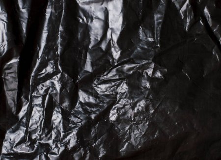 Photo for Texture of dark crumpled polyethylene background - Royalty Free Image
