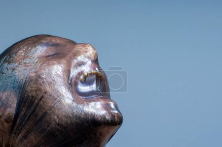 Photo for A man with a plastic bag over his head is suffocating - Royalty Free Image