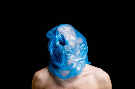 Photo for Portrait strangulation, plastic bag on head - Royalty Free Image