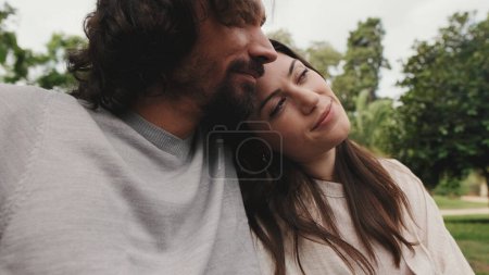 Photo for Close up, love couple hugging on lawn - Royalty Free Image