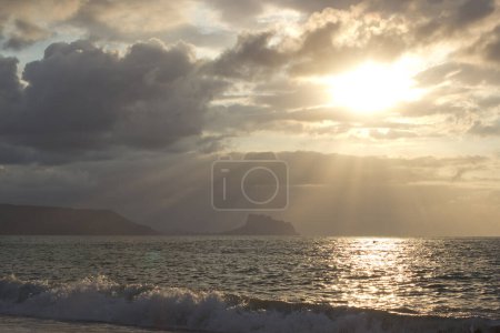 Photo for Beautiful sunrise in Albir, Spain with sea, clouds and sun beams,image for calendar, poster, postcard, brochure, wall canvas, morning nature without people. - Royalty Free Image