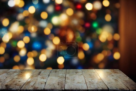 Photo for Wooden table and Christmas lights in background - Royalty Free Image