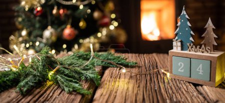 Photo for Christmas decorations on wooden background fireplace - Royalty Free Image