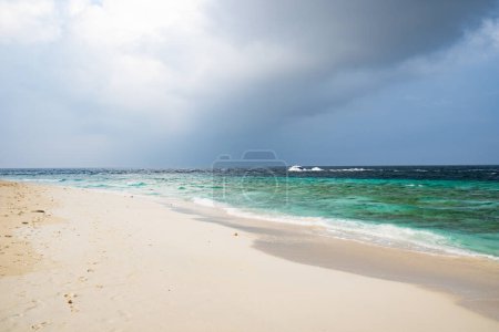 Photo for Beautiful exotic tropical beach and stormy clouds - Royalty Free Image