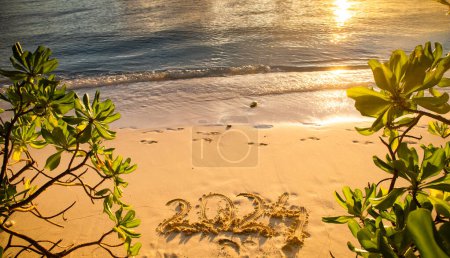 Photo for 2024 written in sand on a tropical island - Royalty Free Image