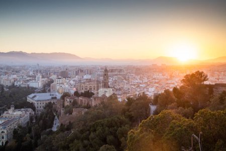 Photo for View over Malaga at sunset travel banner - Royalty Free Image