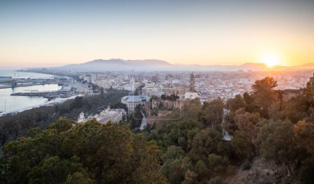 Photo for View over Malaga at sunset travel banner - Royalty Free Image