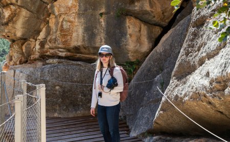 Photo for Woman trekking in Caminito Del Rey Trail in Andalusia - Royalty Free Image