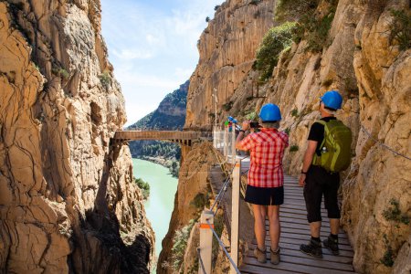 Photo for Elderly couple trekking in Caminito Del Rey Trail in Andalusia - Royalty Free Image