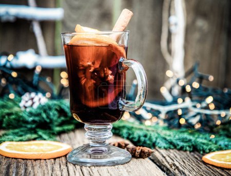 Photo for Mulled wine Christmas drink  on wooden table - Royalty Free Image