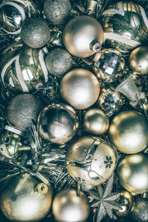 Photo for Top view of golden Christmas decorations in a box - Royalty Free Image