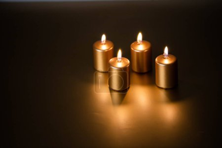 Photo for Advent - Four golden Candles burning - Royalty Free Image