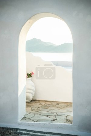 Photo for Traditional Greek door opening to the sea - Royalty Free Image