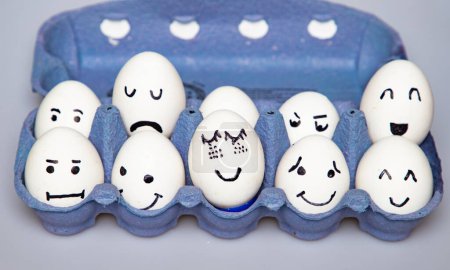 Photo for Eggs with funny faces easter background - Royalty Free Image