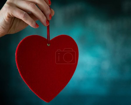 Photo for Woman holding red heart for Valentine - Royalty Free Image
