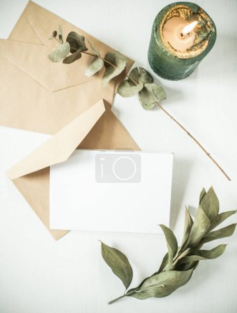 Photo for Blank greeting card  invitation mockup with craft paper envelope  feminine still life composition - Royalty Free Image