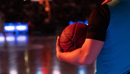 Photo for Referee holding basketball during game - Royalty Free Image