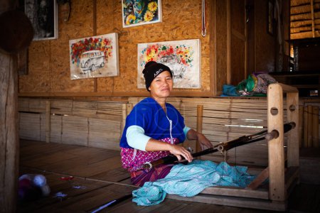 Photo for CHIANG MAI THAILAND- FEBRUARY, 2019 : Hill tribe woman selling her goods in Baan Tong Luang eco village near Chiangmai,Thailand - Royalty Free Image