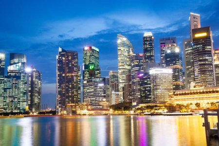 Photo for Singapore skyline at the Marina during twilight - Royalty Free Image