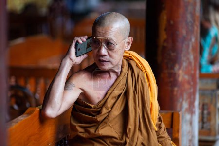 Photo for CHIANG MAI THAILAND- FEBRUARY 19, 2019 :monk in Buddhist temple wat Phra That Doi Suthep Buddhist temple in Chiang Mai, Thailand - Royalty Free Image