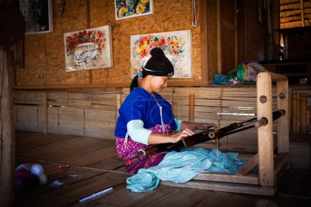 Photo for CHIANG MAI THAILAND- FEBRUARY, 2019 : Hill tribe woman selling her goods in Baan Tong Luang eco village near Chiangmai,Thailand - Royalty Free Image