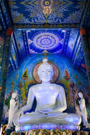 Photo for Buddha statue in blue temple interior in Chiang Rai - Royalty Free Image