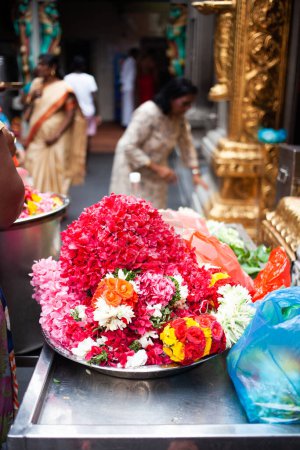 Photo for Worshippers praying in Hindu temple - Royalty Free Image