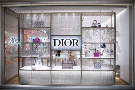 Photo for PARIS, FRANCE - MARCH 30, 2024: Facade of the Dior store in Paris. Dior is a French company founded by designer Christian Dior, which designs and retails luxury goods . - Royalty Free Image
