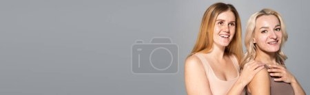 Photo for Carefree women with skin issues posing isolated on grey with copy space, banner - Royalty Free Image