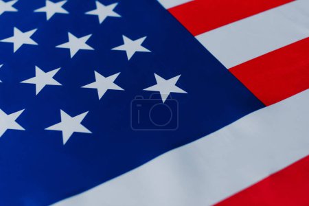 close up view of flag of United States of America with stars and stripes 
