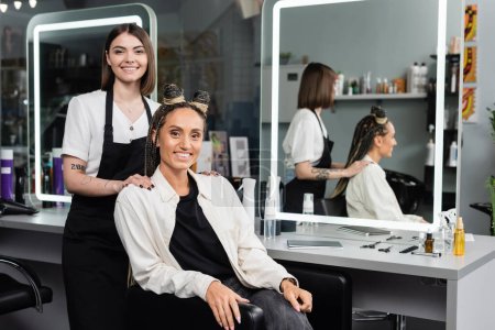 Photo for Client satisfaction, hairdresser and happy woman with braids, hairstyle, mirror, reflection, hair buns, braided hair, beauty salon, hair fashion, salon customer and hairstylist, looking at camera - Royalty Free Image