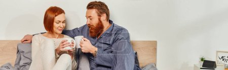 morning rituals, day off without kids, redhead husband and wife, quality time, happiness, bearded man and woman holding cups of coffee, parents alone at home, lifestyle, adult leisure, banner 