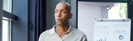 Photo for Chronic illness, inclusion and disability, african american man with myasthenia gravis disease looking at window, pensive and dark skinned office worker in casual attire, banner - Royalty Free Image