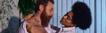 african american woman seducing bearded businessman and looking at his tattoos, secret love, banner